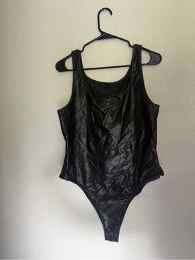 Black Women's One-Piece Bodysuit - Sleek High-Cut Tank